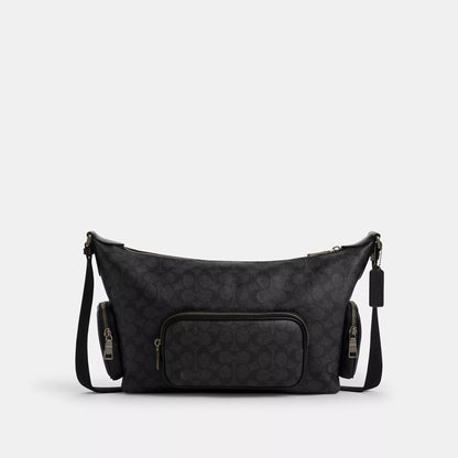 Coach Outlet Finn Crossbody Bag With Pockets In Signature Canvas